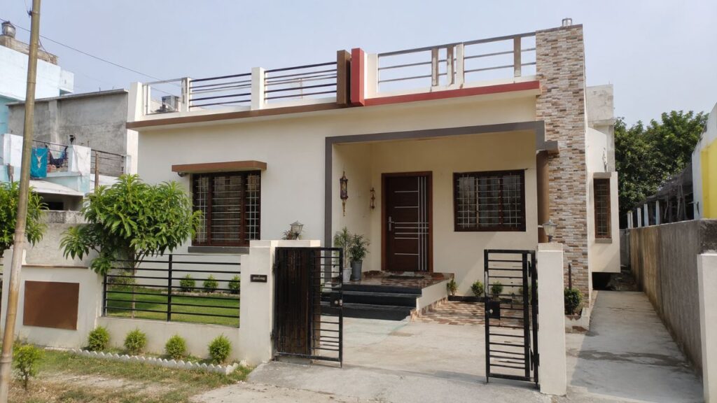 Modern single-floor house in Rudrapur priced under 40 lakhs with parking, front lawn, gated entrance, and contemporary exterior design.