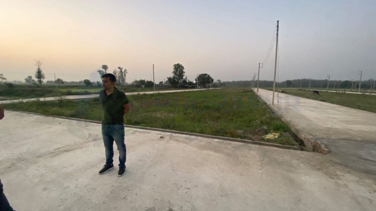 27,000 sq ft land parcel in Jainagar Rudrapur with concrete roads and open development area on Dineshpur Road