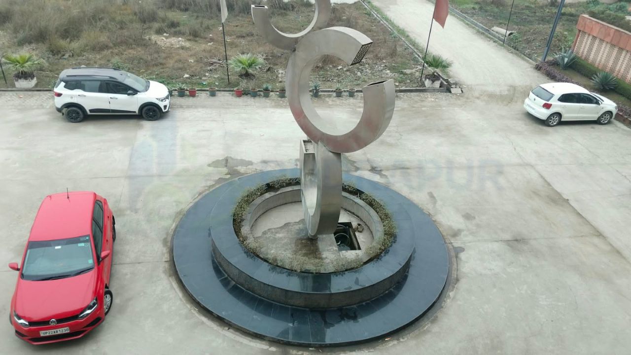 3 BHK flat in Balaji Pranam Rudrapur under 55 lakh with gated society entrance and parking area