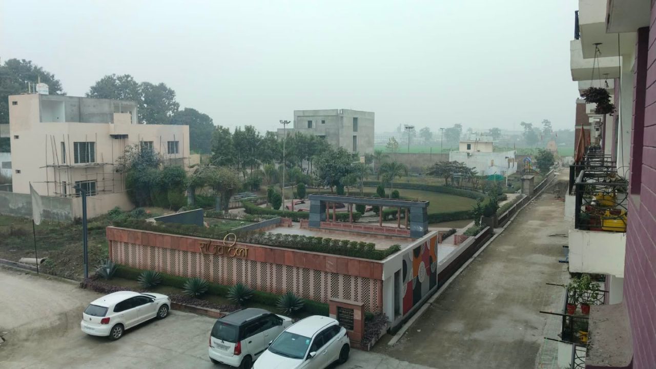 Balaji Pranam Society Danpur Rudrapur with landscaped garden, internal road and parking area