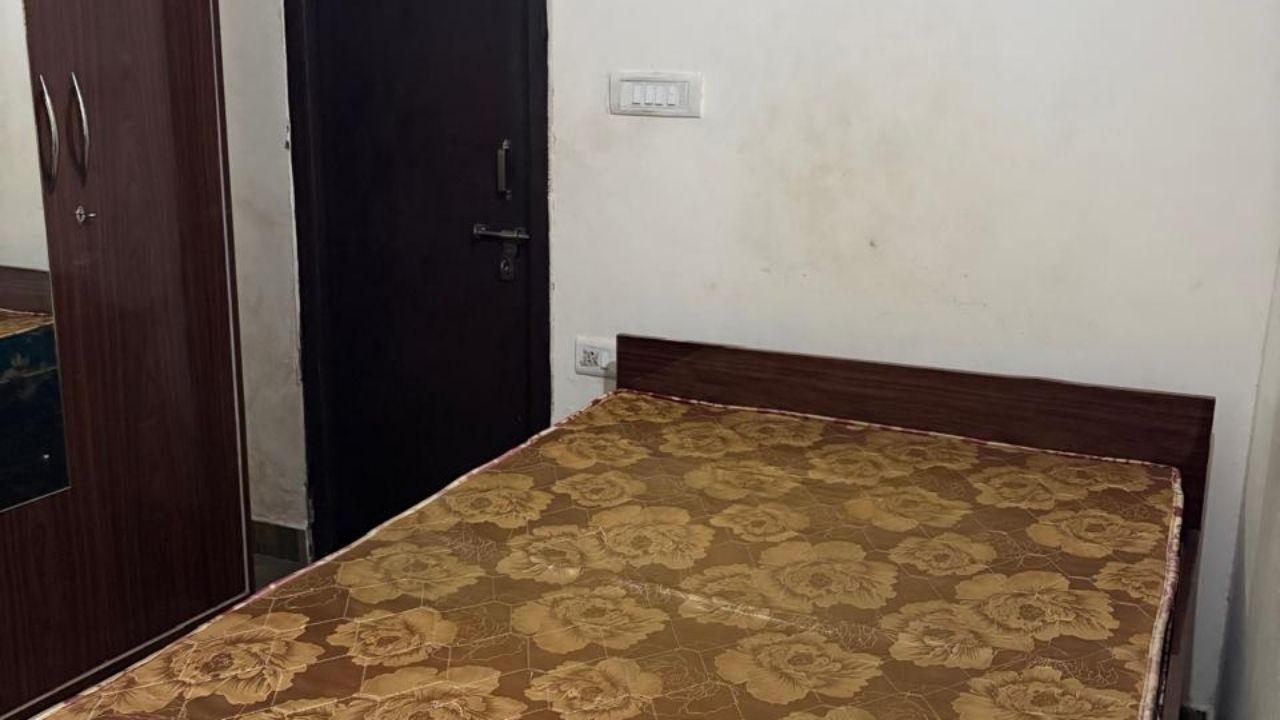 Fully furnished bedroom of 1 BHK flat for sale in Rudrapur under 15 lakh